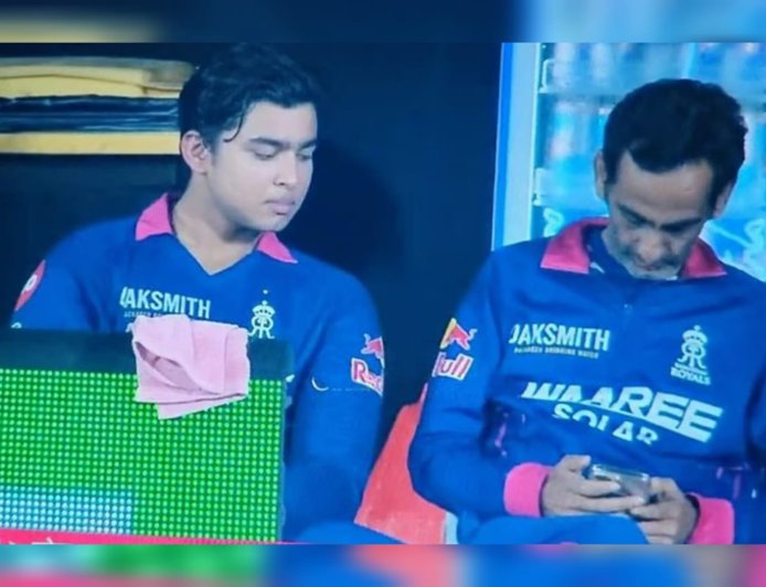 ഡഗൗട്ടിലിരുന്ന് ഫോൺ ഉപയോഗിച്ചു; രാജസ്ഥാൻ റോയൽസ് മാനേജർ വിവാദത്തിൽ; ബിസിസിഐ ചട്ടങ്ങൾ ലംഘിച്ചതായി ആരോപണം